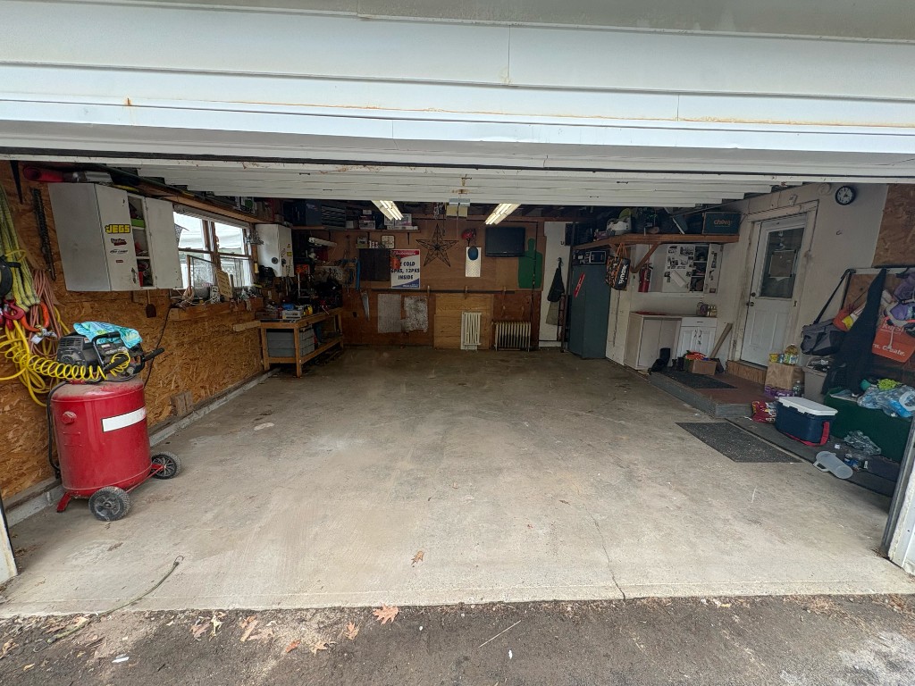Cleared garage after sorting and hauling.